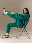 Spodnie sportowe damskie - 4F Spodnie dresowe joggery damskie - zielone XS - miniaturka - grafika 1