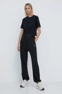 Spodnie damskie - Champion spodnie dresowe kolor czarny gładkie 117199 - grafika 1