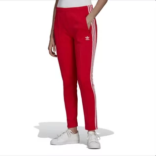 Spodnie sportowe damskie - Spodnie dresowe adidas Originals Primeblue SST Track HF1992 - czerwone - grafika 1