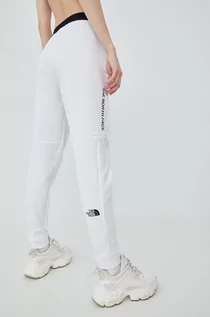 Spodnie damskie - The North Face spodnie dresowe damskie kolor biały z nadrukiem - grafika 1