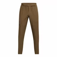 Spodnie sportowe męskie - Męskie spodnie treningowe Under Armour UA Unstoppable Tapered Pants - brązowe - UNDER ARMOUR - miniaturka - grafika 1