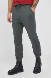 Spodnie męskie - G-Star Raw spodnie dresowe kolor zielony gładkie - grafika 1