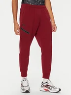 Spodnie sportowe męskie - Under Armour Spodnie dresowe UA Unstoppable 1389353 Czerwony Regular Fit - miniaturka - grafika 1