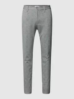 Spodnie męskie - Spodnie materiałowe o kroju slim tapered fit z wpuszczanymi kieszeniami model ‘MARK’ - grafika 1