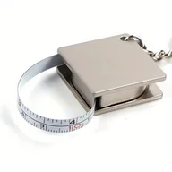 Inne - TEMU Brelok z Wysuwaną Taśmą Mierzącą ze Stali Nierdzewnej - Kompaktowe i Wytrzymałe Narzędzie Pomiarowe do Codziennego Użytku - miniaturka - grafika 1