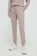 Spodnie damskie - Armani Exchange spodnie dresowe kolor beżowy gładkie - miniaturka - grafika 1