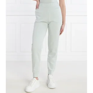 Calvin Klein Spodnie dresowe | Relaxed fit - Dresy damskie - miniaturka - grafika 1
