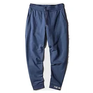Spodnie męskie - THE NORTH FACE Spodnie treningowe Zumu Shady Blue L - miniaturka - grafika 1