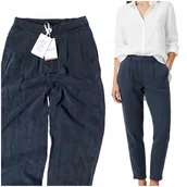 Spodnie damskie - Tommy Hilfiger Nowe Spodnie Damskie Szersze Biodra Lyocell Lejące się 32 - miniaturka - grafika 1