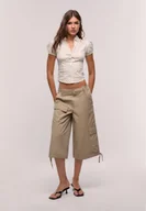 Koszule damskie - Stradivarius Dopasowana koszula z krótkim rękawem w grochy Jasnoszary L - miniaturka - grafika 1