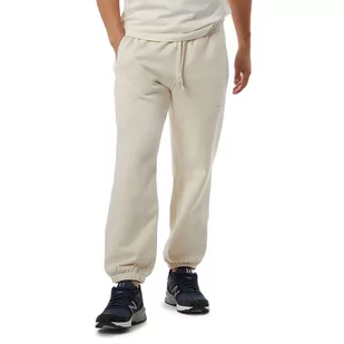 Spodnie dresowe New Balance MP23551GIE - beżowe - Spodnie sportowe męskie - miniaturka - grafika 1
