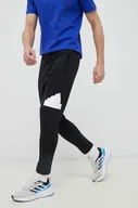 Spodnie męskie - adidas spodnie dresowe kolor czarny z aplikacją - miniaturka - grafika 1
