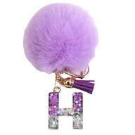 Breloki - Breloczek z pomponem fioletowym - litera H, stylowy dodatek - miniaturka - grafika 1