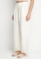 Spodnie damskie - Jasnobeżowe Szerokie Spodnie z Bawełną Wysokim Stanem i Naszywką Nannirea - miniaturka - grafika 1