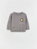 Bluzki dla niemowląt - Reserved - Bawełniany longsleeve Smiley - ciemnoszary - miniaturka - grafika 1
