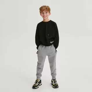 Spodnie i spodenki dla chłopców - Reserved - Dresowe joggery z zamkami - Szary - grafika 1