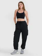 Spodnie sportowe damskie - 4F Spodnie casual cargo damskie - czarne L - miniaturka - grafika 1