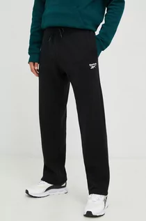 Spodnie męskie - Reebok spodnie dresowe męskie kolor czarny z nadrukiem - grafika 1
