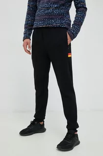 Spodnie męskie - Rip Curl spodnie dresowe Surf Revival męskie kolor czarny z aplikacją - grafika 1