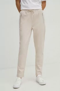 Spodnie damskie - Medicine spodnie dresowe damskie kolor beżowy gładkie - grafika 1