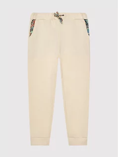 Spodnie i spodenki dla chłopców - Roxy Spodnie dresowe Marine Bloom ERGFB03220 Beżowy Rekaxed Fit - grafika 1