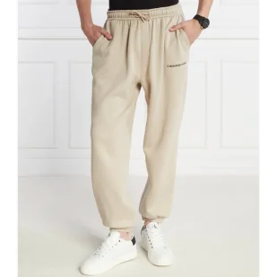 CALVIN KLEIN JEANS Spodnie dresowe | Regular Fit - Dresy męskie - miniaturka - grafika 1