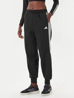 Spodnie sportowe damskie - adidas Spodnie dresowe Tiro 3-Stripes JL7488 Czarny Loose Fit - miniaturka - grafika 1