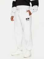 Spodnie sportowe męskie - Champion Spodnie dresowe 220434 Szary Loose Fit - miniaturka - grafika 1