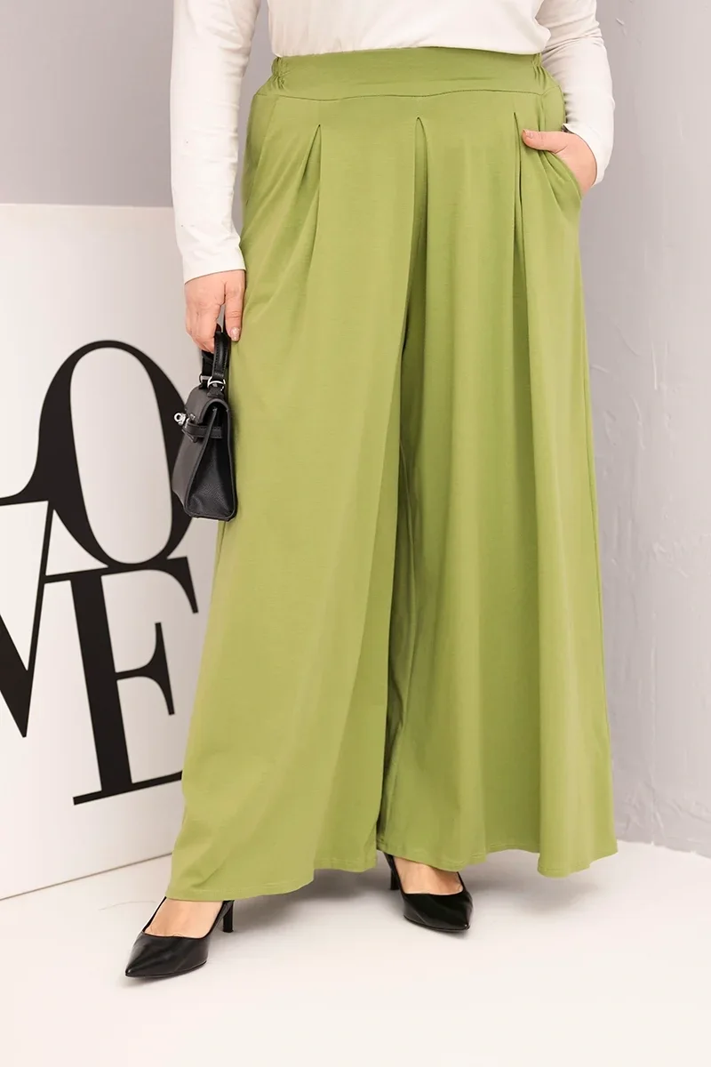 Spodnie damskie bawełniane Plus Size o szerokiej nogawce i luźnym kroju pistacjowe Pistacjowy