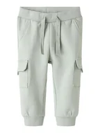 Spodenki dla niemowląt - name it Spodnie dresowe "Sanus" w kolorze zielonym - miniaturka - grafika 1