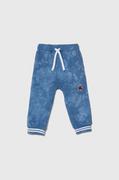 Spodnie i spodenki dla chłopców - United Colors of Benetton spodnie dresowe bawełniane dziecięce kolor niebieski wzorzyste - miniaturka - grafika 1