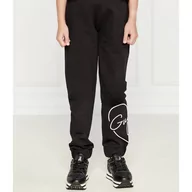 Spodnie sportowe damskie - Guess Spodnie dresowe ACTIVE | Regular Fit - miniaturka - grafika 1