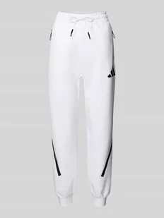 Spodnie dresowe z elastycznym pasem i tunelem - Spodnie sportowe damskie - miniaturka - grafika 1