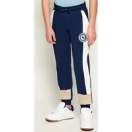 Spodnie i spodenki dla chłopców - Guess Spodnie dresowe Regular Fit - miniaturka - grafika 1