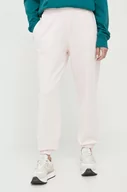 Spodnie damskie - New Balance spodnie dresowe bawełniane kolor różowy gładkie - miniaturka - grafika 1
