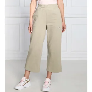 Tommy Hilfiger Spodnie dresowe | flare fit - Dresy damskie - miniaturka - grafika 1