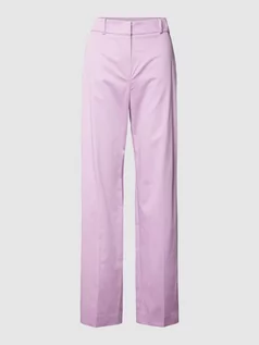 Spodnie damskie - Spodnie materiałowe z wpuszczanymi kieszeniami w stylu francuskim - grafika 1