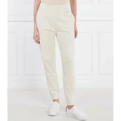 Dresy damskie - Calvin Klein Spodnie dresowe | Relaxed fit - miniaturka - grafika 1