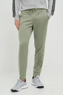 Spodnie męskie - New Balance spodnie dresowe Tenacity Performance męskie kolor zielony z nadrukiem - grafika 1