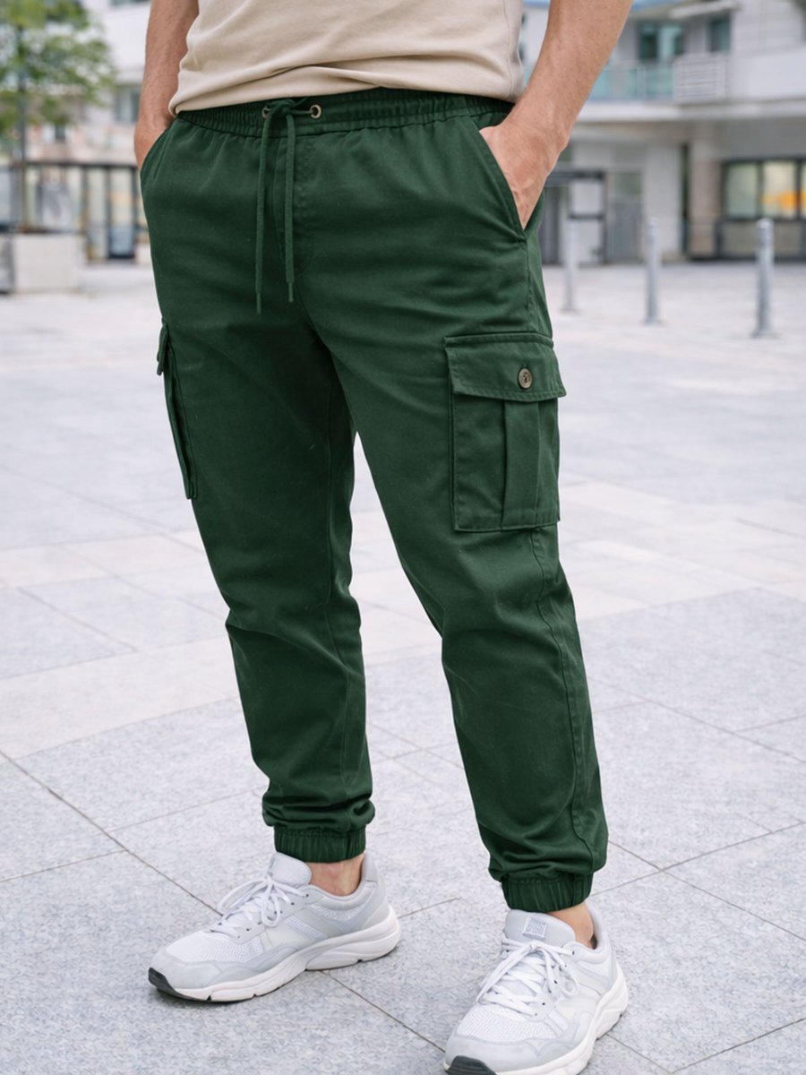 Joggery bawełniane ciemny zielony 36