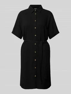 Sukienki - Sukienka T-shirtowa o długości do kolan z wykładanym kołnierzem model ‘VINSTY’ - grafika 1
