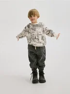 Bluzy i sweterki niemowlęce - Reserved - Bluza Muminki - złamana biel - miniaturka - grafika 1