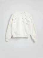 Bluzy damskie - Reserved - Bawełniana bluza z aplikacją - kremowy - miniaturka - grafika 1