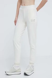 Spodnie damskie - EA7 Emporio Armani spodnie dresowe kolor beżowy gładkie - grafika 1