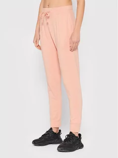 Spodnie sportowe damskie - Outhorn Spodnie dresowe SPDD603 Różowy Regular Fit - grafika 1