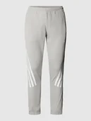 Spodnie sportowe męskie - Spodnie dresowe z paskami w kontrastowym kolorze - miniaturka - grafika 1