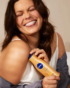 NIVEA Q10 Gradual Tan Q10 Body Lotion 200 ml - Balsamy i kremy do ciała - miniaturka - grafika 3