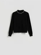 Swetry damskie - Reserved - Sweter z ozdobną aplikacją - czarny - miniaturka - grafika 1