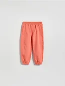 Spodenki dla niemowląt - Reserved - Bawełniane spodnie jogger - czerwony - miniaturka - grafika 1