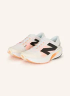 Moda i Uroda OUTLET - New Balance Buty Do Biegania Fuelcell Rebell v4 weiss - miniaturka - grafika 1